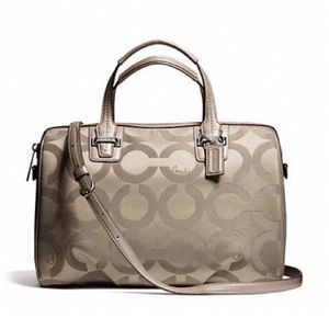 Coach Tan Satchel with Signature Design and Versatile Strap